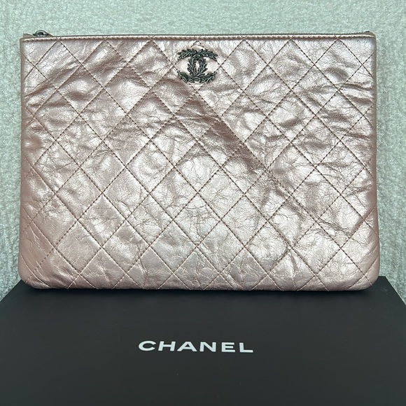 CHANEL Handbags - Chanel Quilted O Case Pink Metallic Crinkle Leather